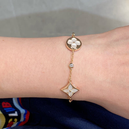 Mysitc STAR AND SUN 4 MOTIF WHITE MOP PINK GOLD BRACELET