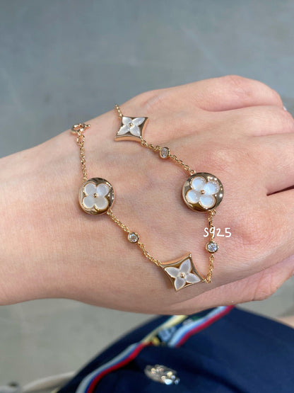 Mysitc STAR AND SUN 4 MOTIF WHITE MOP PINK GOLD BRACELET