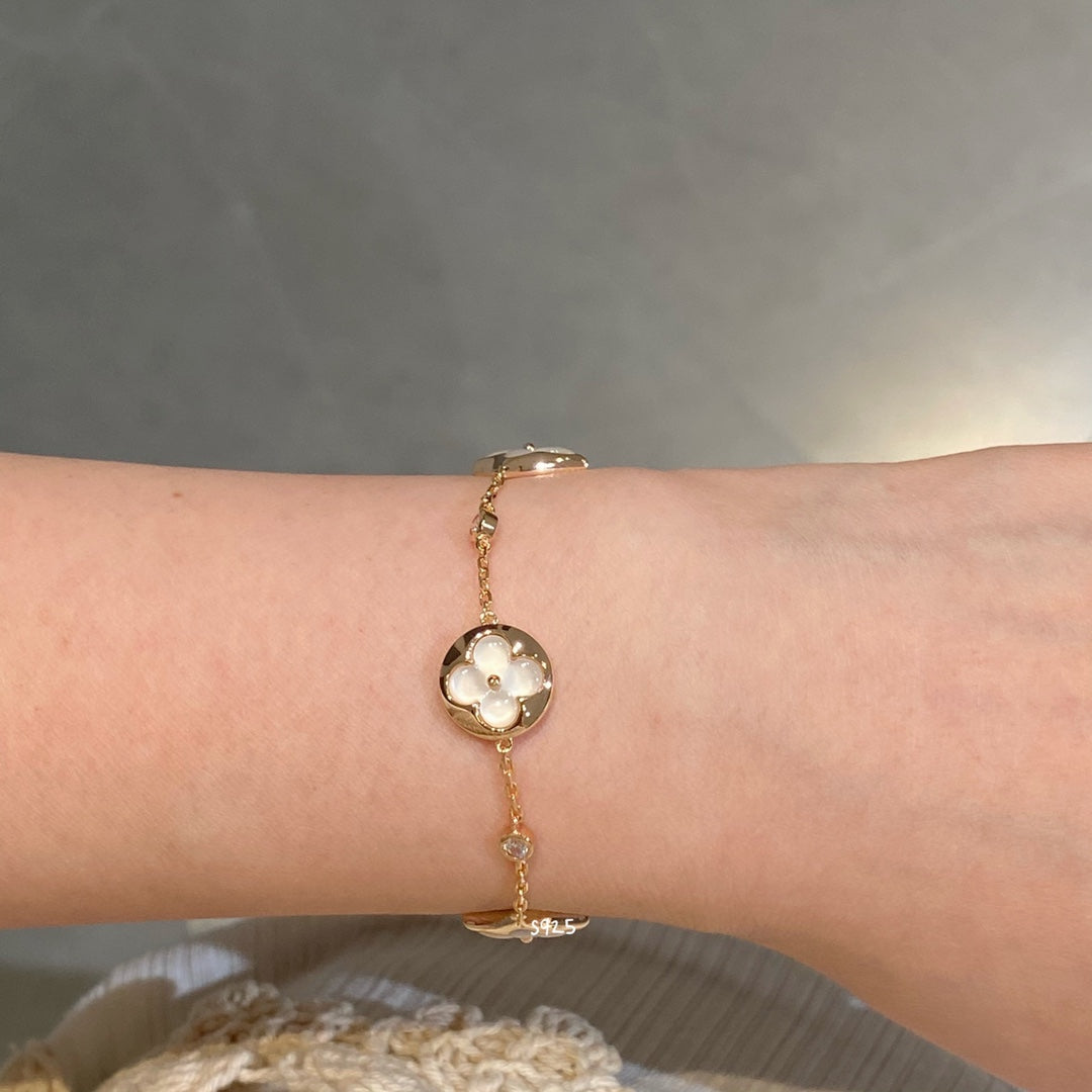 Mysitc STAR AND SUN 4 MOTIF WHITE MOP PINK GOLD BRACELET
