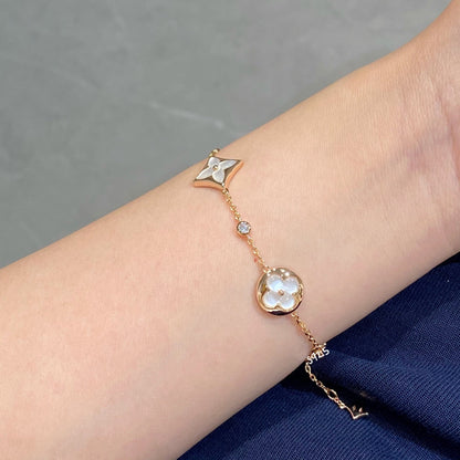 Mysitc STAR AND SUN 4 MOTIF WHITE MOP PINK GOLD BRACELET