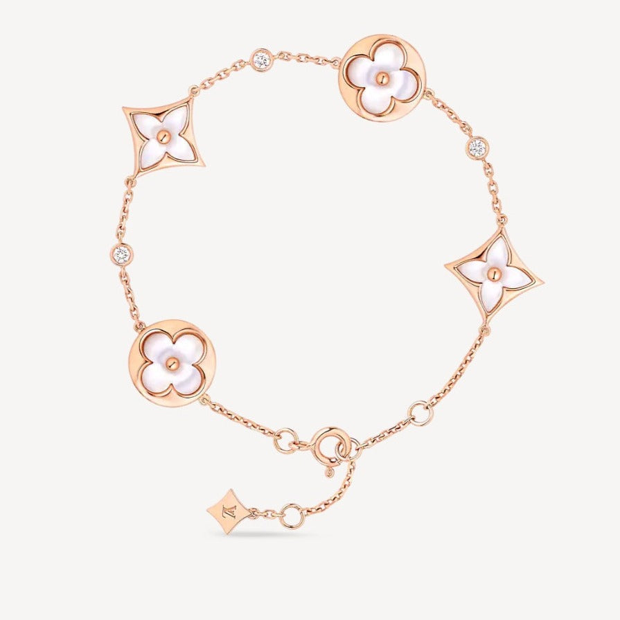 Mysitc STAR AND SUN 4 MOTIF WHITE MOP PINK GOLD BRACELET