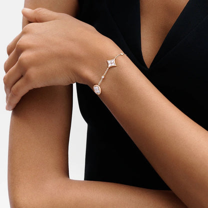 Mysitc STAR AND SUN 4 MOTIF WHITE MOP PINK GOLD BRACELET